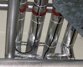 Overhead suspended pipework protected with TT1000 sensing cable.