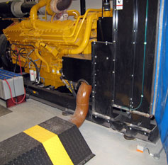AT-OPSEN optical sensor fitted around a generator to detect leaks of fuel or coolant