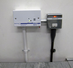 AT-G-SENSE refrigerant sensor fitted at low level within a comms room.